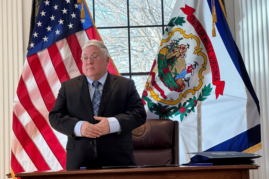 FILE - West Virginia Gov. Patrick Morrisey speaks during a news conference at the State Capitol in Charleston, W.Va., Jan. 14, 2024. (AP Photo/Leah Willingham, file)