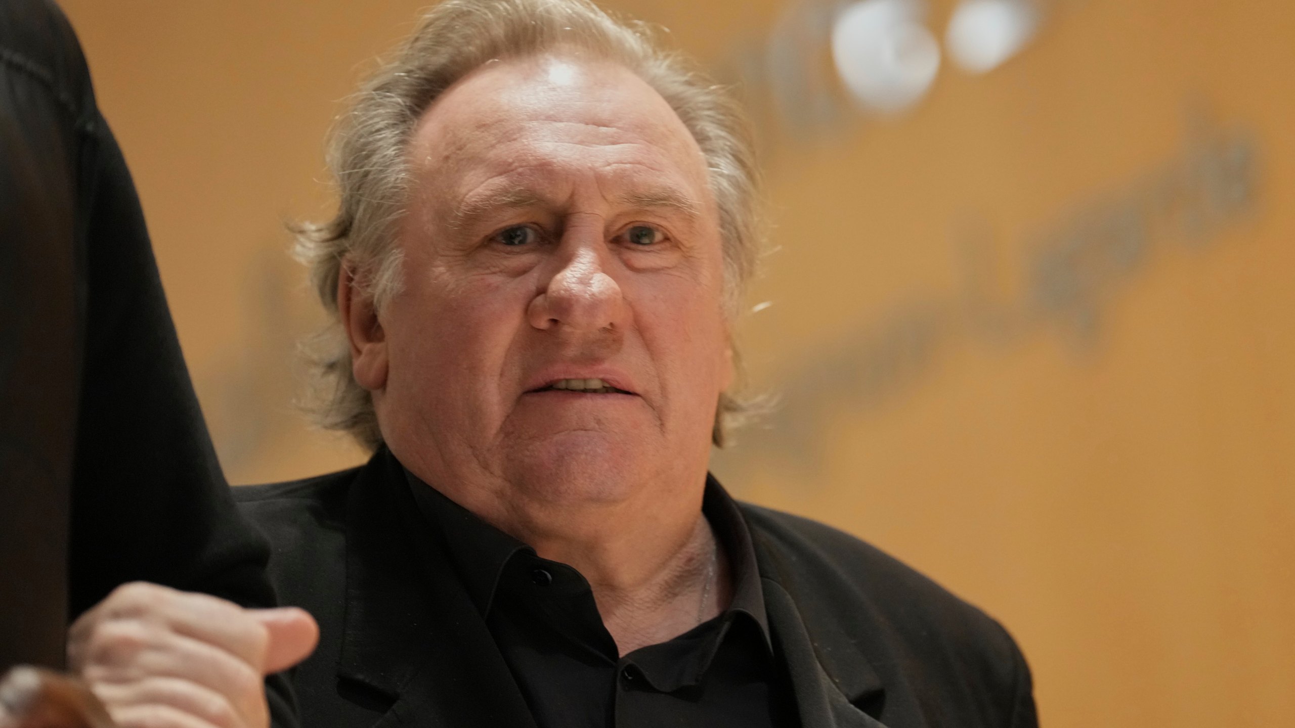 French actor Gerard Depardieu leaves for a break during his trial for the alleged sexual assaults of two women on a film set in 2021, Wednesday, March 26, 2025 in Paris. (AP Photo/Aurelien Morissard)
