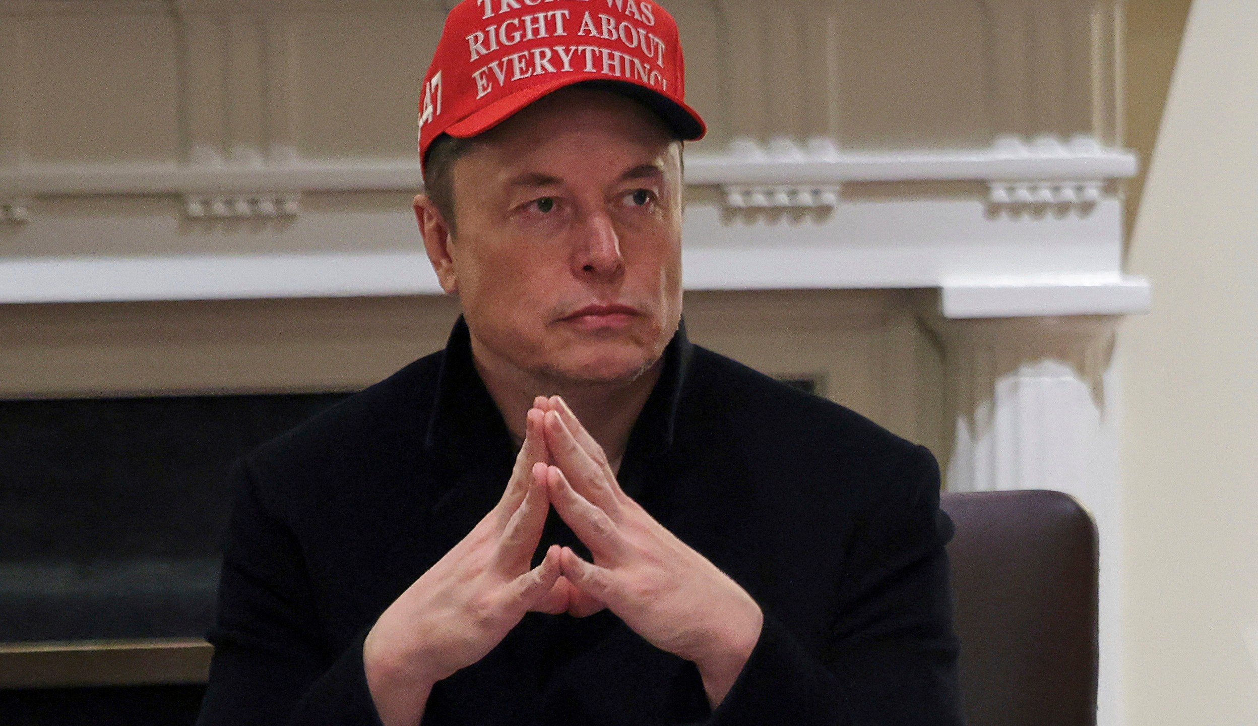Elon Musk attends a cabinet meeting at the White House in Washington, Monday, March 24, 2025. (Pool via AP)