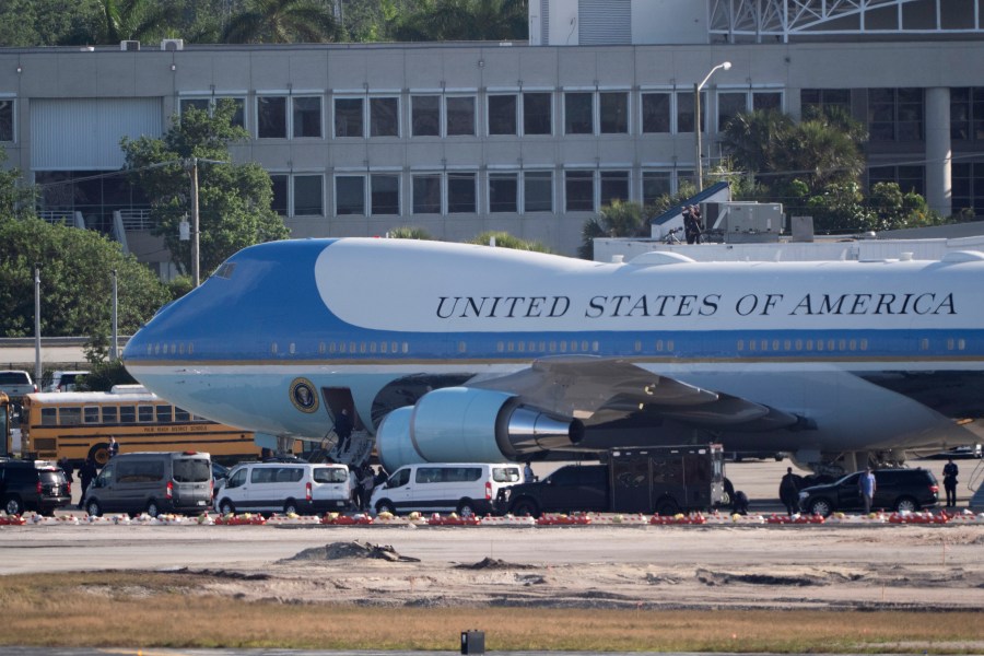 President Donald Trump boards Air Force One as he leaves Palm Beach International Airport, Sunday, March 30, 2025, in West Palm Beach, Fla. (AP Photo/Manuel Balce Ceneta)