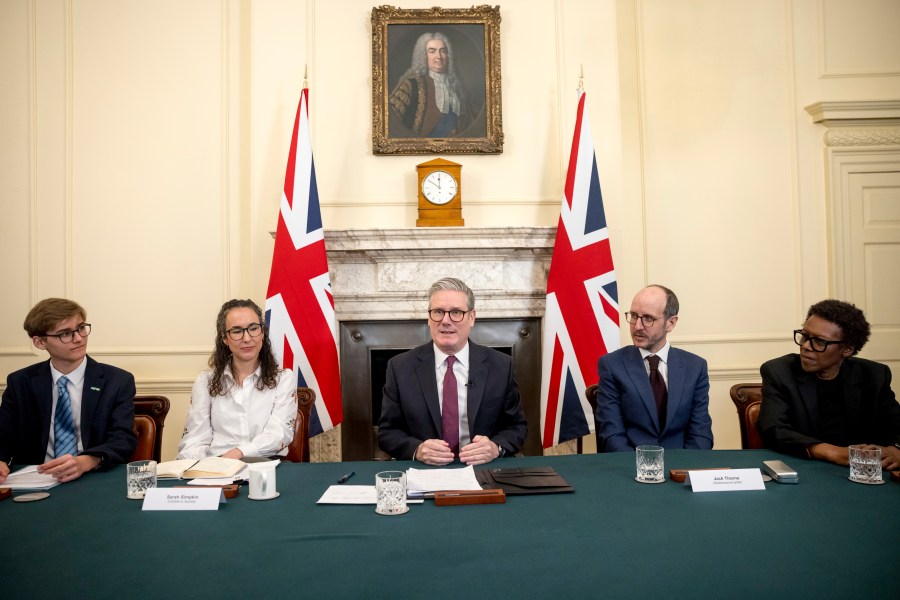British Prime Minister Keir Starmer, centre, holds a roundtable meeting at Number 10 Downing Street in London, Monday March 31, 2025. (Jack Taylor/Pool Photo via AP)