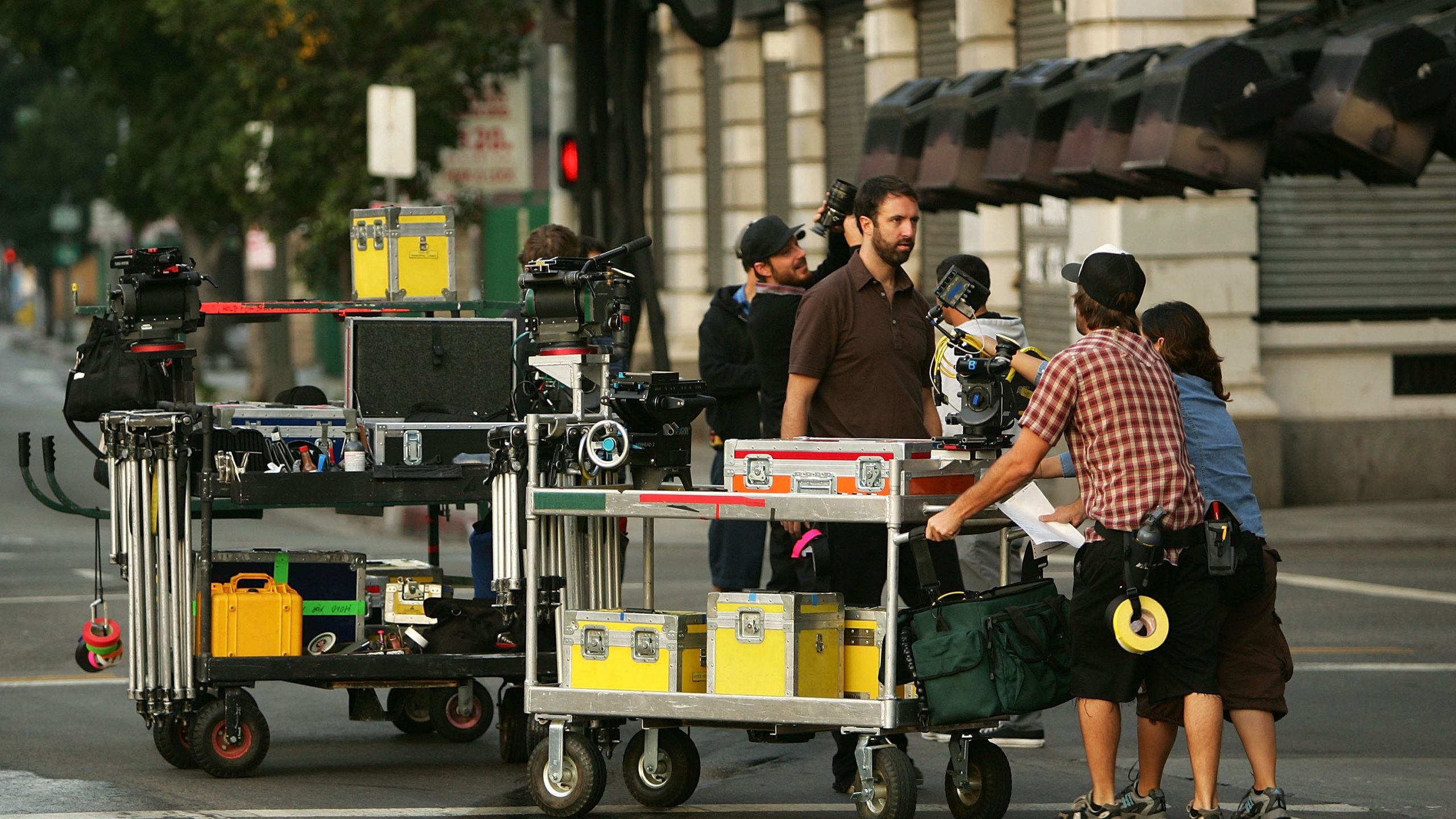 A crew sets up cameras for the filming a mobile phone commercial on-location on November 18, 2006 in Los Angeles, California. (Photo by David McNew/Getty Images)