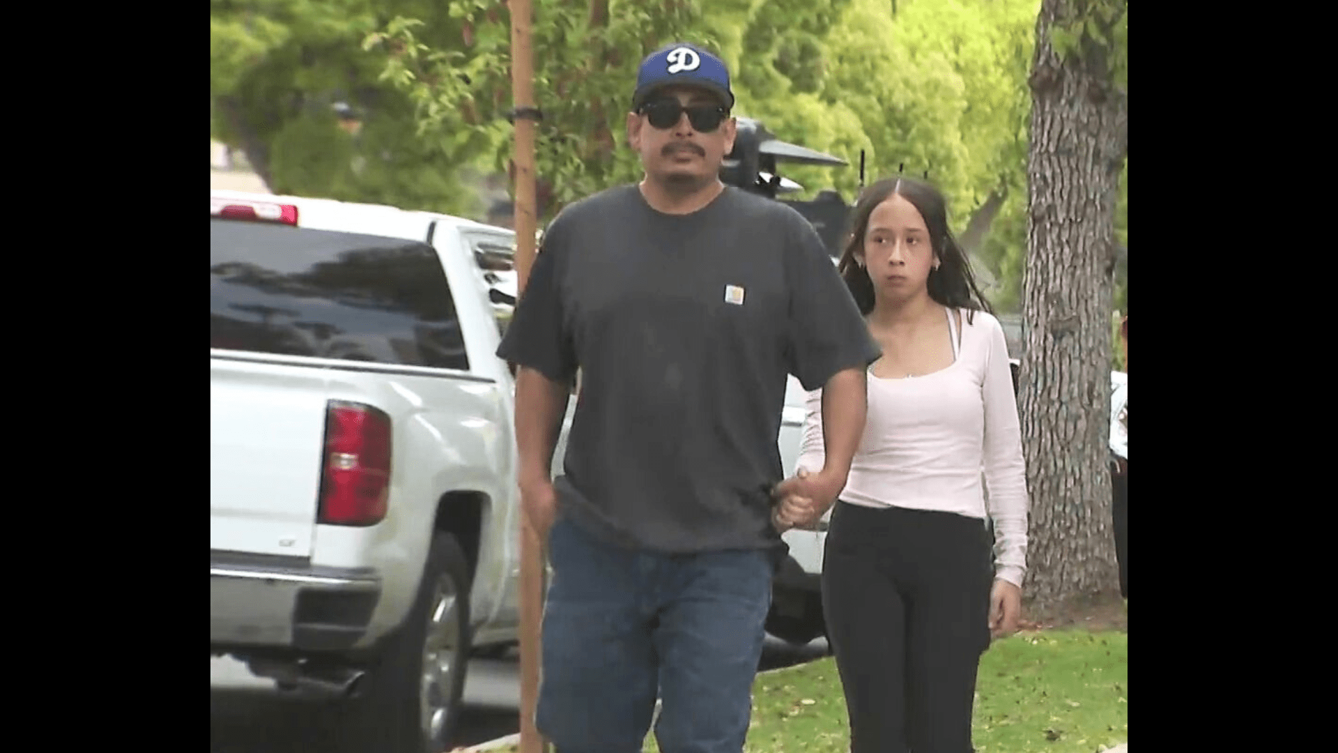 Ricardo Hurtado, his daughter Noemi Hurtado, held a press conference outside Blair Middle School in Pasadena on March 28, 2025. (KTLA)
