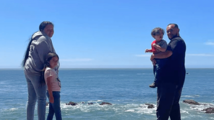 Jesse Garza is seen with his wife and two children. (Garza Family)