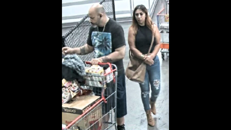 Surveillance video from a Costco shows Daniel Cordova and an unidentified woman allegedly using stolen credit cards to make purchases. (Tustin Police Department)