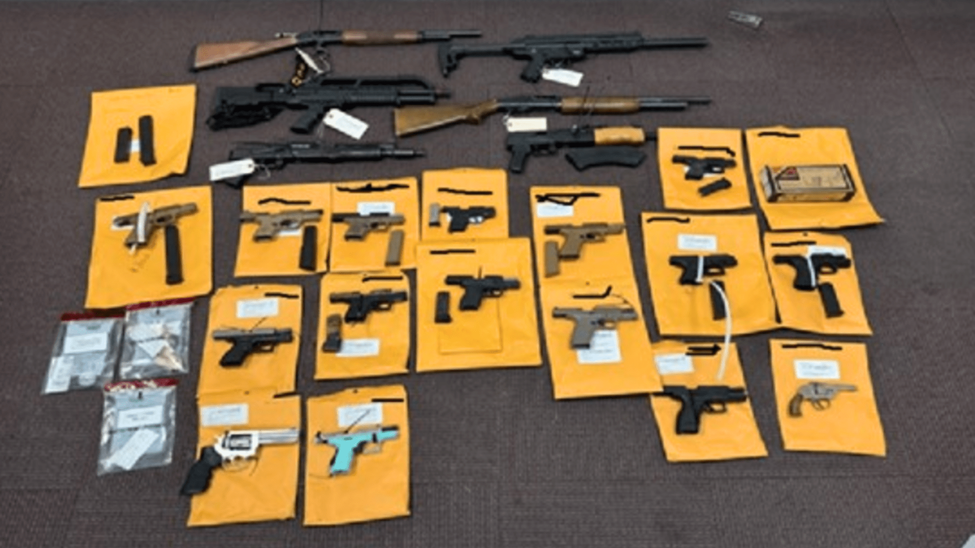 Thirteen suspected gang members were arrested and detectives seized 23 firearms, including two AK-47 rifles, high-capacity magazines, ammunition, and a large quantity of narcotics on March 20, 2025. (Los Angeles County Sheriff’s Department)