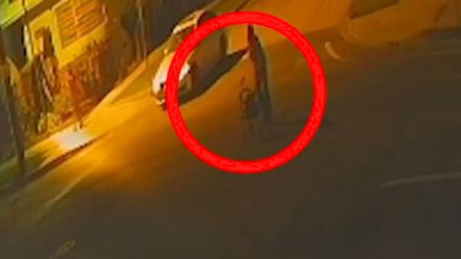 Surveillance footage showed the victim crossing Figueroa Street near 104th Place in South L.A. when he was struck and killed by a hit-and-run driver in a white sedan on Feb. 24, 2025. (Los Angeles Police Department)