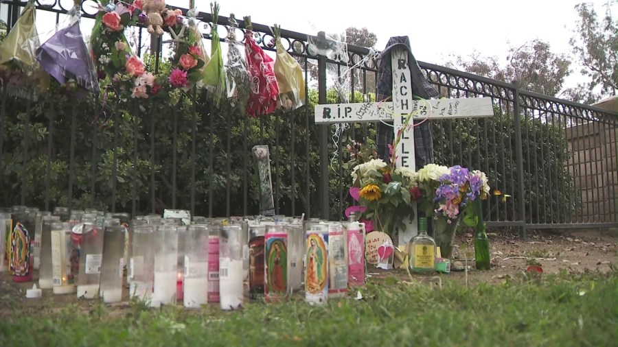 Friends and loved ones created a memorial outside Rachelle Lopez's apartment to honor her. (KTLA)