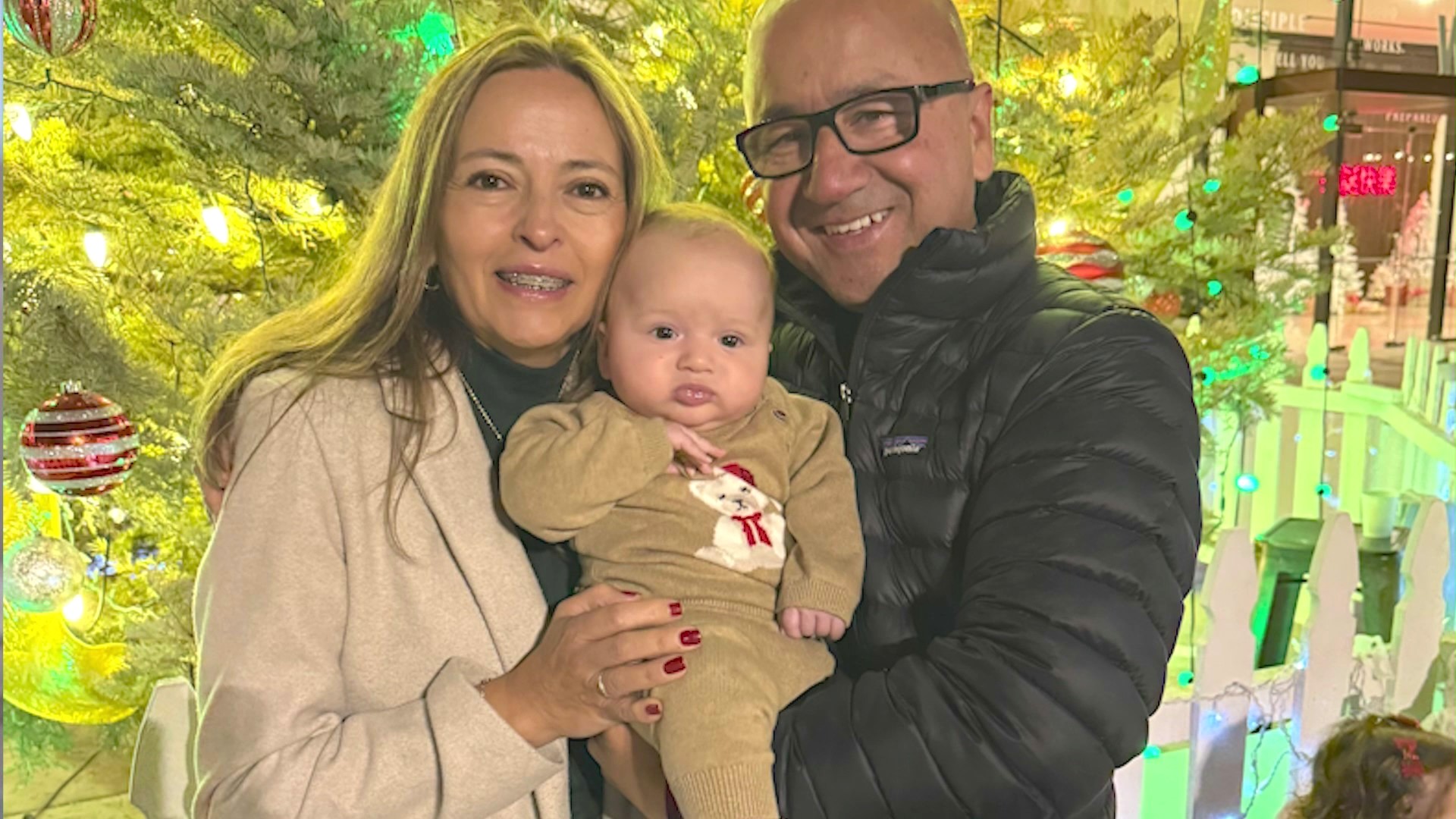 Gladys and Nelson Gonzalez are pictured with their grandson. (Gonzalez Family)