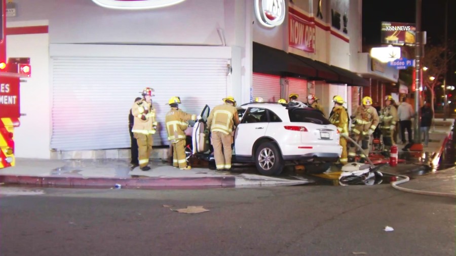 A hit-and-run driver ditched her SUV after crashing into a building, killing a 4-year-old boy and leaving his mother hospitalized in the Baldwin Hills/Crenshaw neighborhood on March 18, 2025. (KTLA)