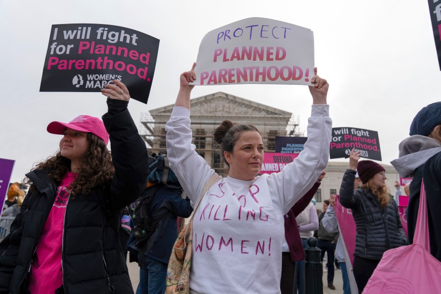 Abortion-rights activists rally outside the Supreme Court in Washington, Wednesday, April 2, 2025. (AP Photo/Jose Luis Magana)