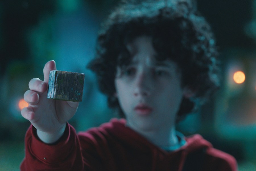 This image released by Warner Bros. Pictures shows Sebastian Hansen in a scene from "A Minecraft Movie." (Warner Bros. Pictures via AP)