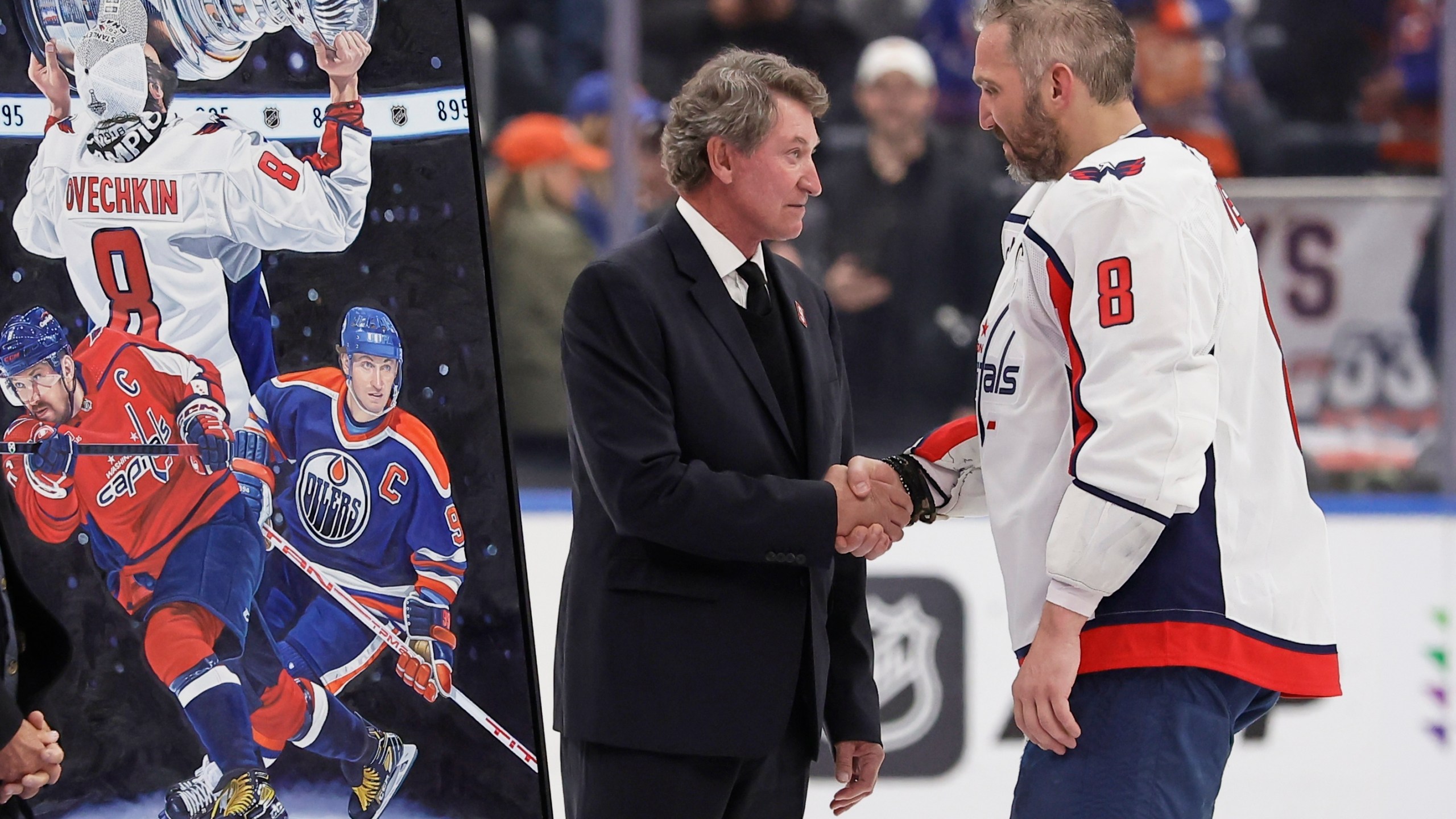Washington Capitals left wing Alex Ovechkin (8) is greeted by Wayne Gretzky during a ceremony after he scored his 895th career goal during the second period of an NHL hockey game against New York Islanders in Elmont, N.Y., Sunday, April 6, 2025. (AP Photo/Adam Hunger)