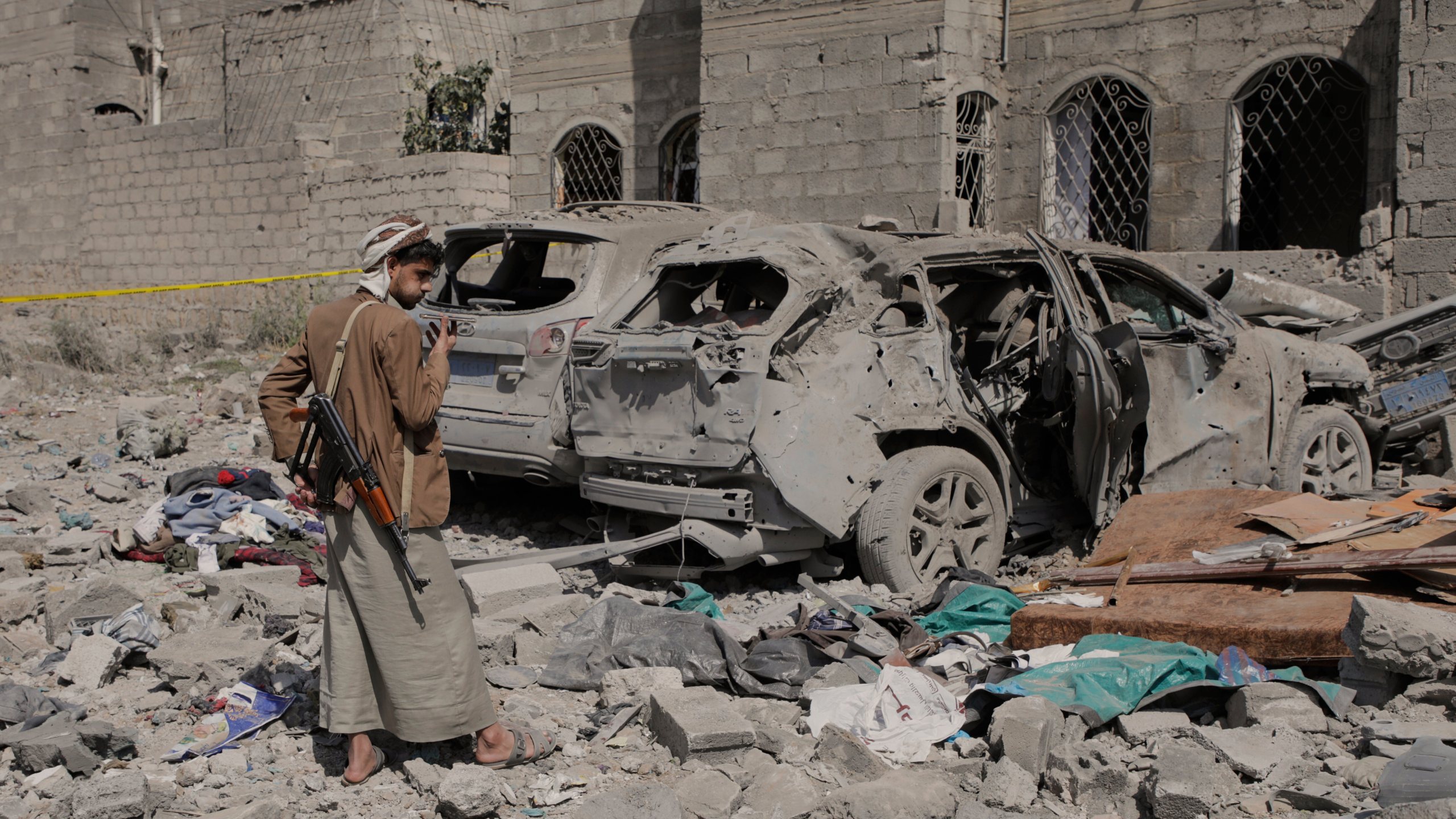 A Yemeni inspects the damage reportedly caused by U.S. airstrikes in Sanaa, Yemen, Monday, April 7, 2025. (AP Photo)