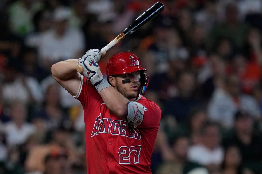 Los Angeles Angels' Mike Trout bats during the third inning of a baseball game against the Houston Astros, Saturday, April 12, 2025, in Houston. (AP Photo/Kevin M. Cox)