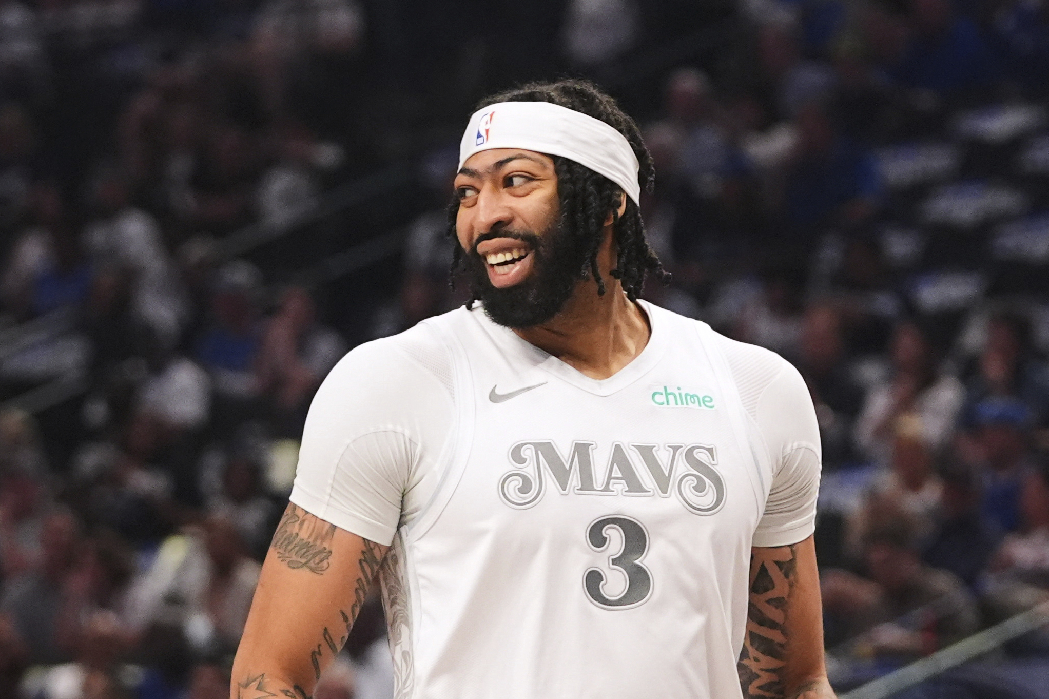 Dallas Mavericks' Anthony Davis laughs in the first half of an NBA basketball game against the Toronto Raptors in Dallas, Friday, April 11, 2025. (AP Photo/LM Otero)