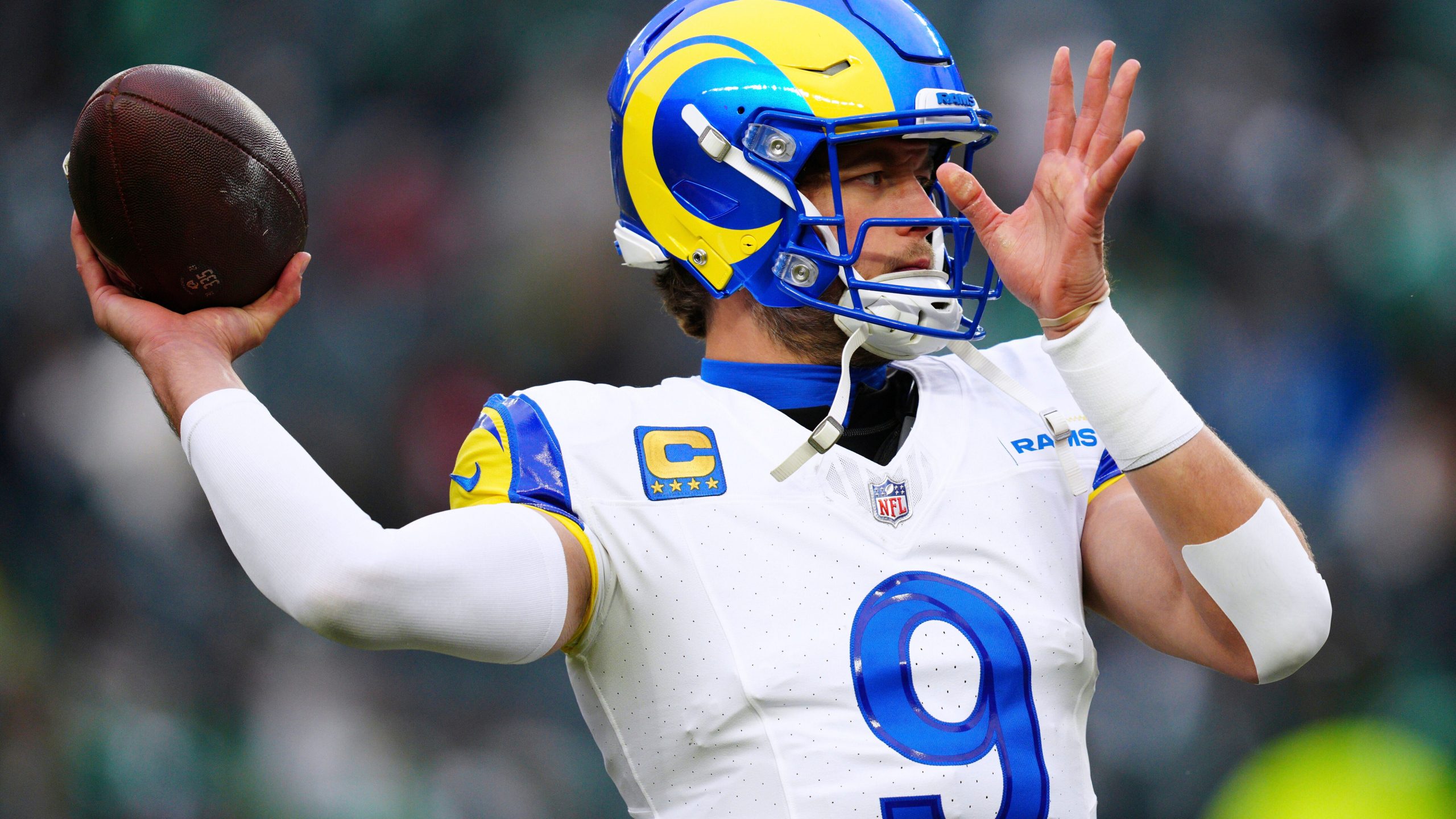 FILE - Los Angeles Rams quarterback Matthew Stafford warms up before an NFL football NFC divisional playoff game against the Philadelphia Eagles on Jan. 19, 2025, in Philadelphia. (AP Photo/Derik Hamilton, File)