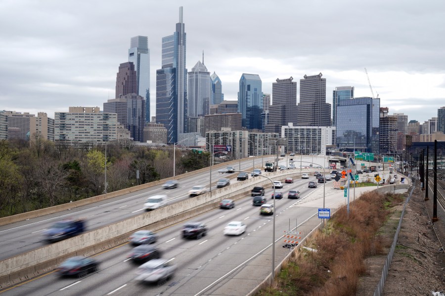 FILE - Motor vehicle traffic moves along the Interstate 76 highway in Philadelphia, Wednesday, March 31, 2021. (AP Photo/Matt Rourke, File)