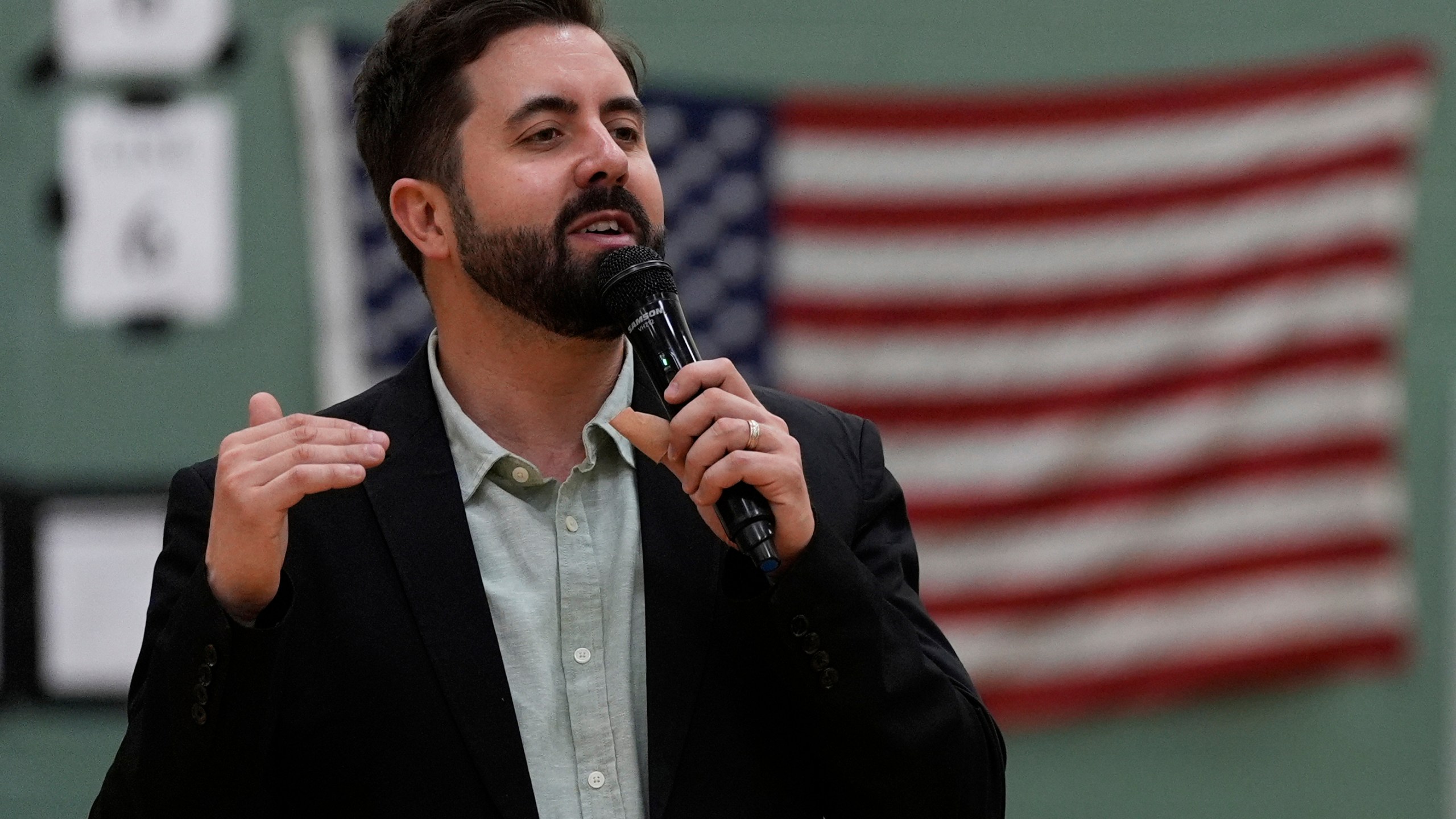 River Church Cincinnati pastor Cory Bowman, who is Vice President JD Vance's half brother and Cincinnati mayoral candidate, preaches during Easter worship service in the Hays Porter Elementary School gym Sunday, April 20, 2025, in Cincinnati. (AP Photo/Carolyn Kaster)