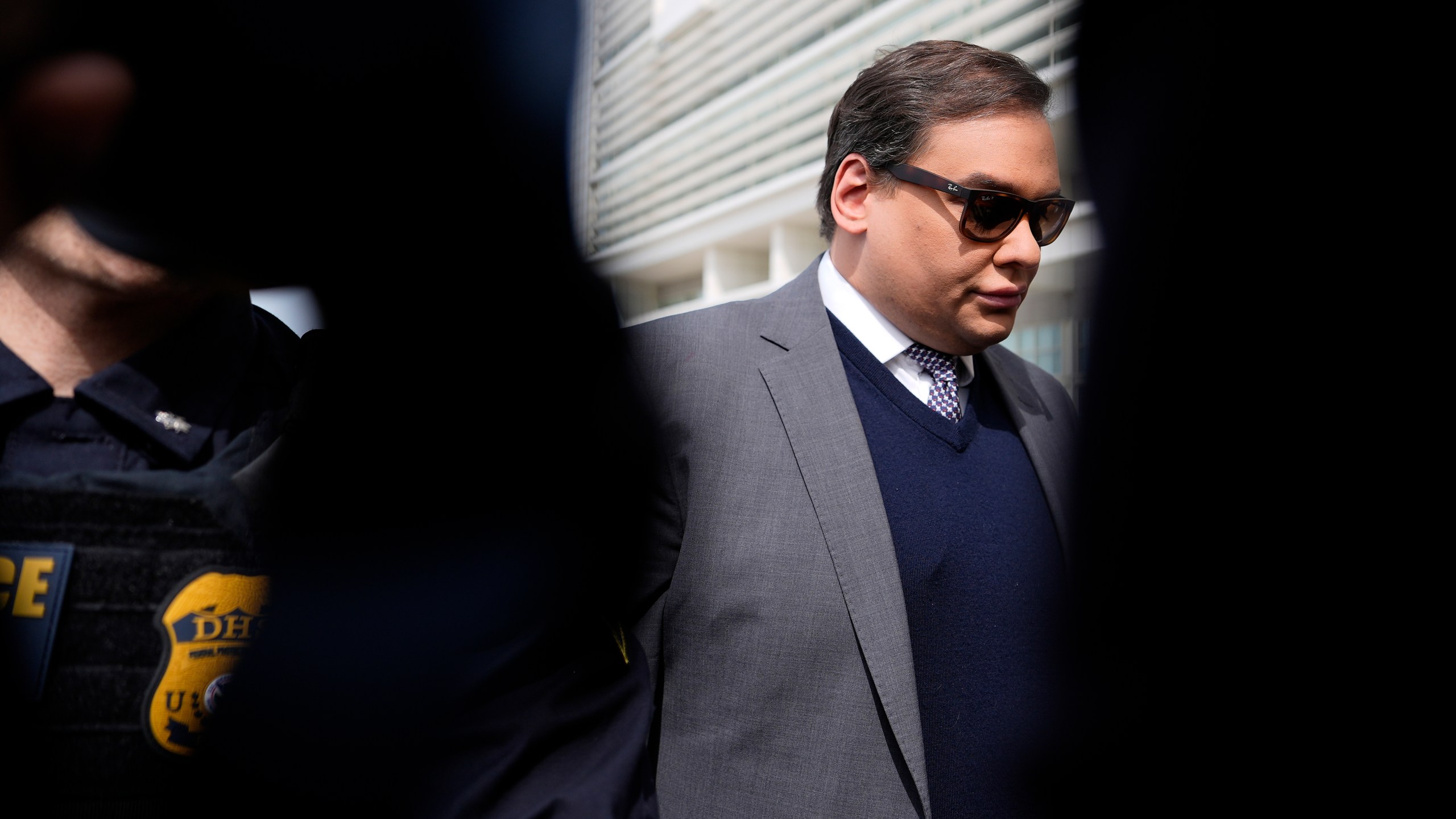 Former U.S. Rep. George Santos arrives at federal court for sentencing, Friday, April 25, 2025, in Central Islip, N.Y. (AP Photo/Julia Demaree Nikhinson)