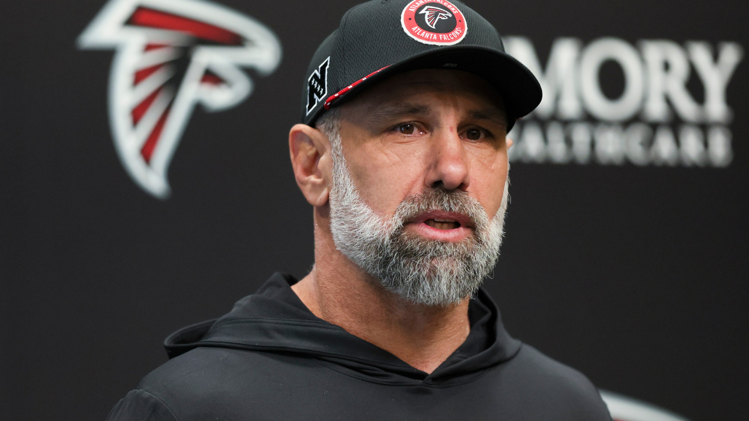 FILE - Atlanta Falcons defensive coordinator Jeff Ulbrich speaks with members of the media at the Falcons Training Camp, Jan. 27, 2025, in Flowery Branch, Ga. (Jason Getz/ Atlanta Journal-Constitution via AP, File)