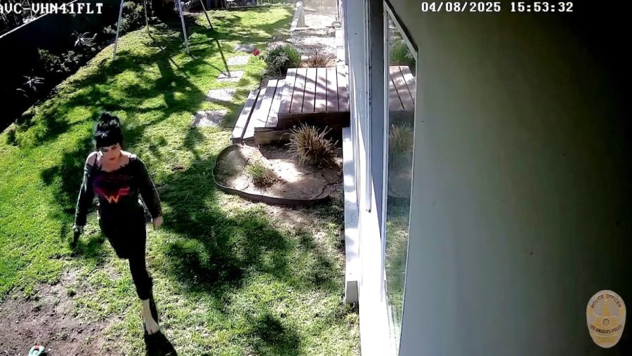 Security footage shows Jillian Shriner, 51, moments after she was shot by police after she allegedly opened fire on officers surrounding her backyard on April 8, 2025. (Los Angeles Police Department)