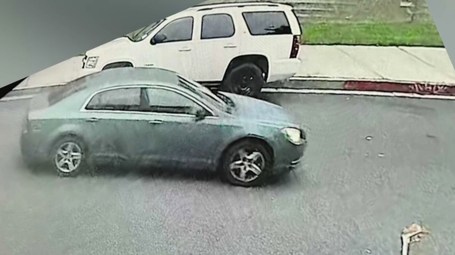 Surveillance cameras captured the suspect's vehicle, described by Inglewood police as a 2008-2012 silver, blue or green Chevy Malibu sedan with tinted rear windows. (Inglewood Police Department)