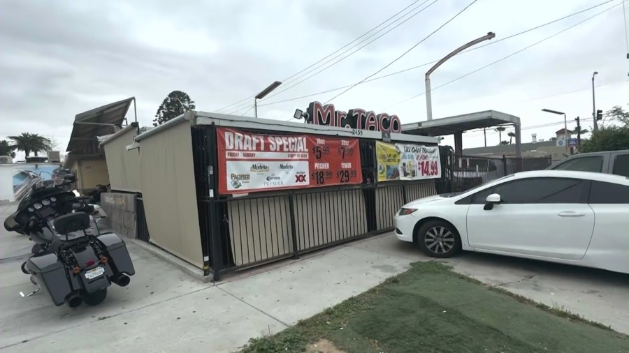 Christian Barragan operates his late father's restaurant, Mr. Taco, on Main Street in downtown Riverside. (KTLA)