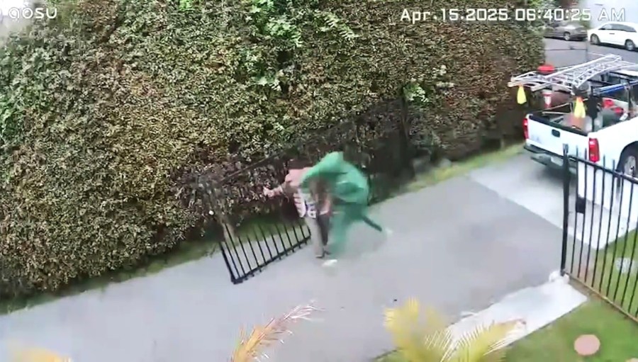 Surveillance video captured the moment a suspect ran up to Javier Ibarra outside his Inglewood home and began violently punching and beathing him while yelling racial slurs on April 15, 2025. (Inglewood Police Department)