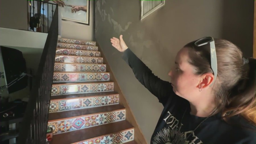 Nicole Hunter was trapped in her bedroom on the second story when a kitchen appliance sparked a fire in her Anaheim home. (KTLA)