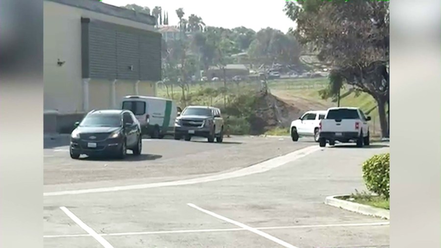 Cell phone video from a witness showed several unmarked vehicles and vans reportedly belonging to U.S. Customs and Border Protection as agents surrounded a Home Depot store in Pomona and arrested a group of day laborers on April 22, 2025.