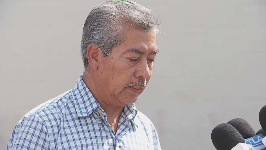 Martin Majin Leon holds a press conference with his family as he speaks to the media in Pomona outside his barber shop on April 24, 2025. (KTLA)