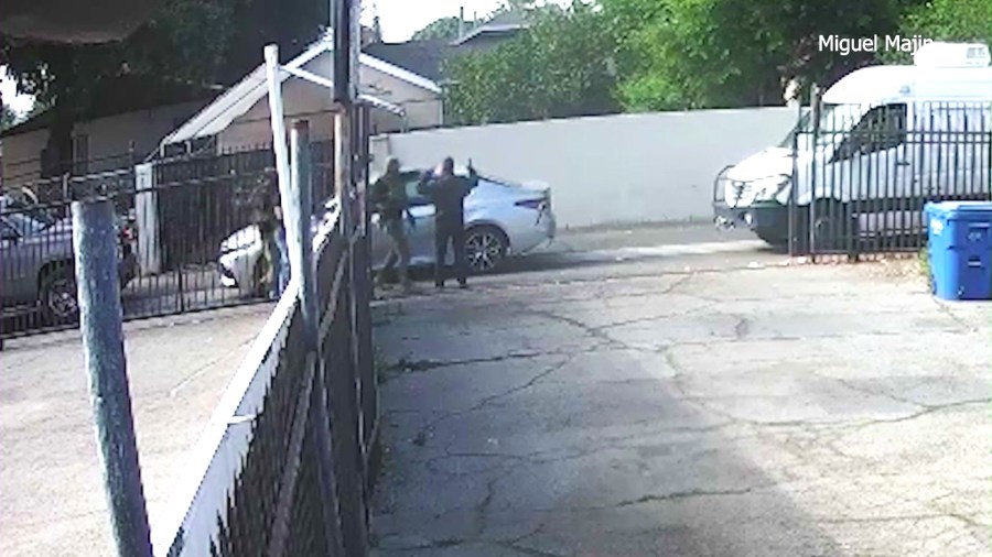 Surveillance video showed Martin Majin Leon being surrounded at gunpoint and taken into custody by immigration officials outside his barber shop in Pomona on April 22, 2025. (Miguel Majin)