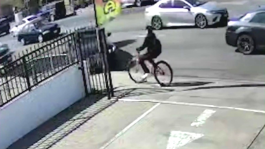 Surveillance cameras captured a hit-and-run driver in a BMW sedan crashing into Sebastian Carillo, 15, as he rode his bicycle on a sidewalk in South Los Angeles on April 7, 2025. (Mariscos El Bigoton)