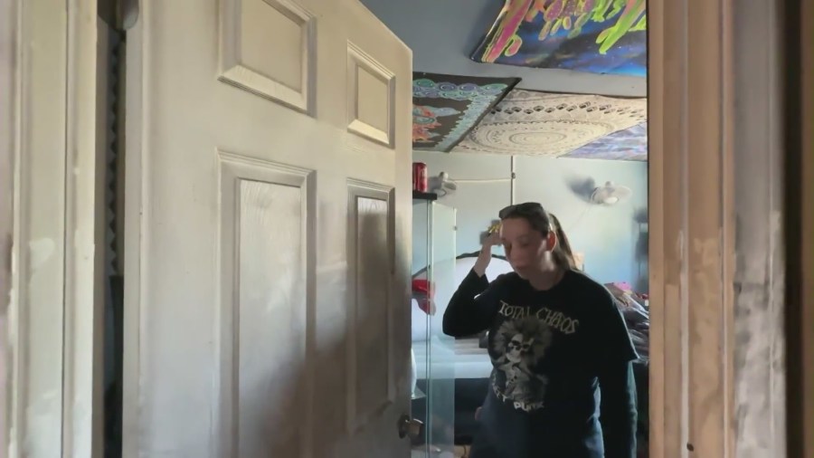 Nicole Hunter was trapped in her bedroom on the second story when a kitchen appliance sparked a fire in her Anaheim home. (KTLA)