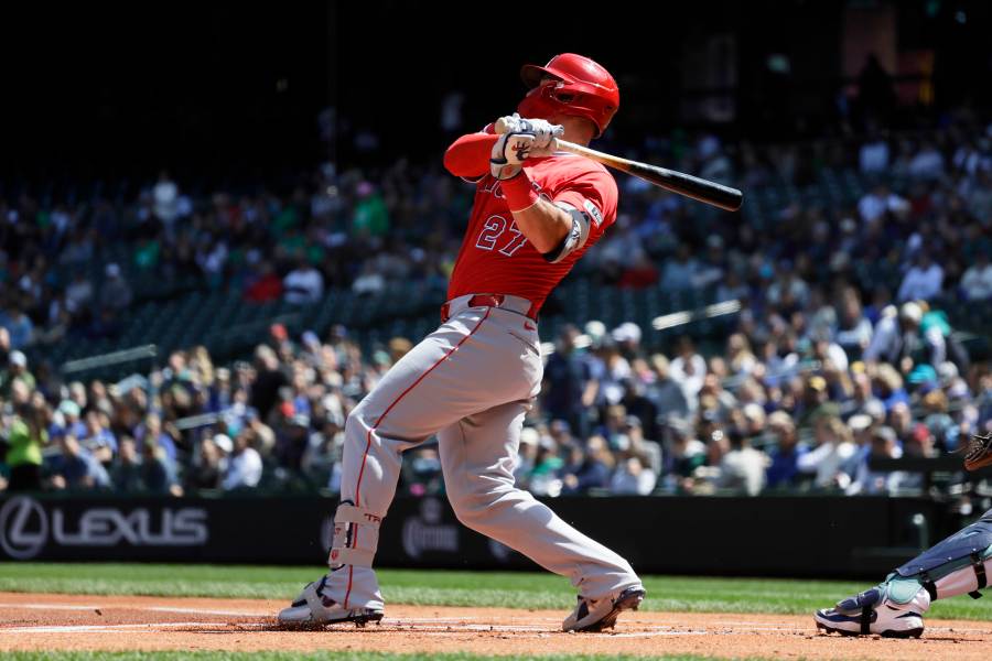 Los Angeles Angels' Mike Trout hits a single against the Seattle Mariners during the first inning of a baseball game, Wednesday, April 30, 2025, in Seattle. (AP Photo/John Froschauer)