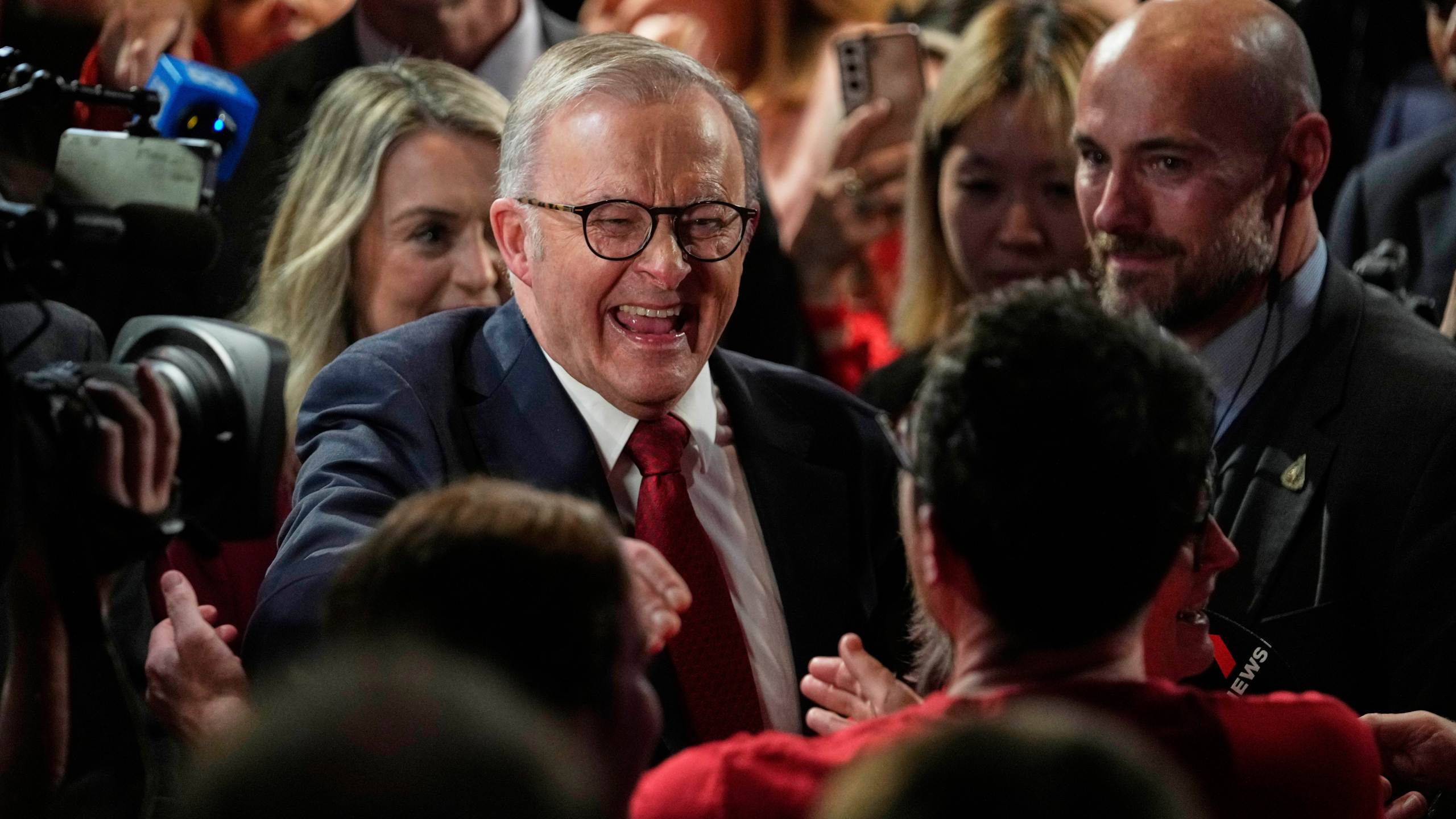 Australian Prime Minister Anthony Albanese reacts as he meets party faithful after winning a second term of the general election in Sydney, Saturday, May 3, 2025. (AP Photo/Rick Rycroft)