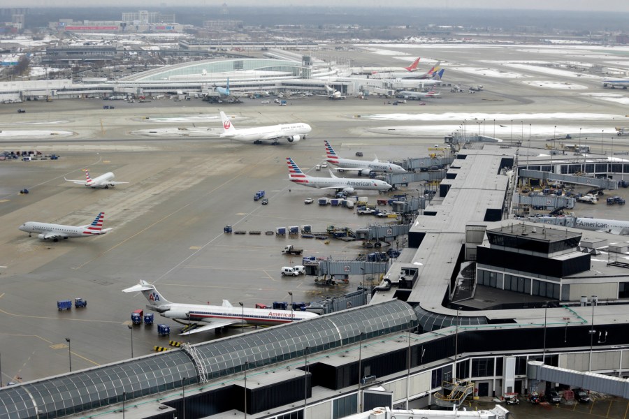 FILE - In this Feb. 11, 2015, file photo, ground traffic is seen from the control tower at O'Hare International Airport in Chicago. (AP Photo/M. Spencer Green File)
