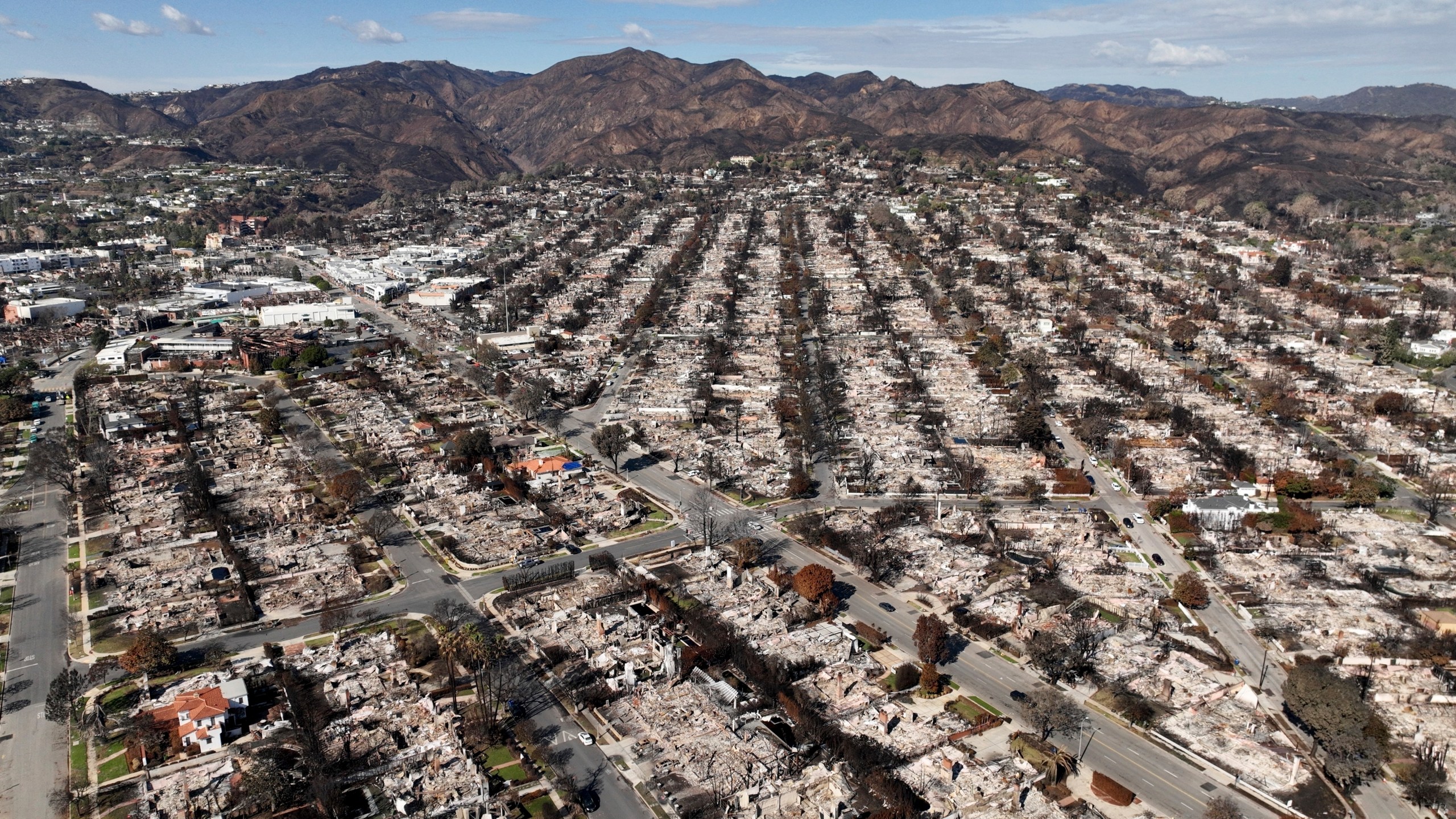 FILE - The devastation from the Palisades Fire is shown in an aerial view in the Pacific Palisades neighborhood of Los Angeles, Monday, Jan. 27, 2025. (AP Photo/Jae C. Hong, File)