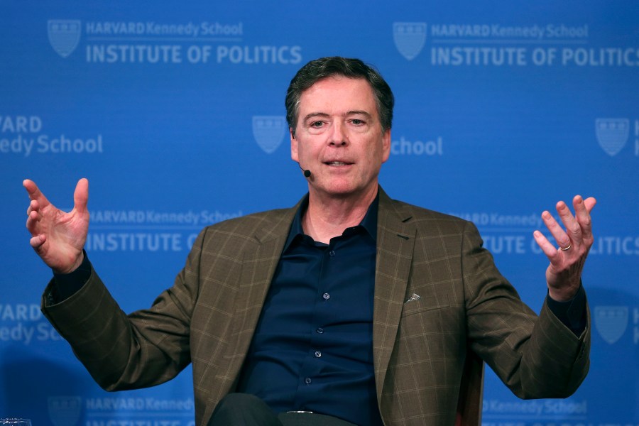 FILE - Former FBI director James Comey gestures while speaking at Harvard University's Institute of Politics' JFK Jr. Forum in Cambridge, Mass., Feb. 24, 2020. (AP Photo/Charles Krupa, File)