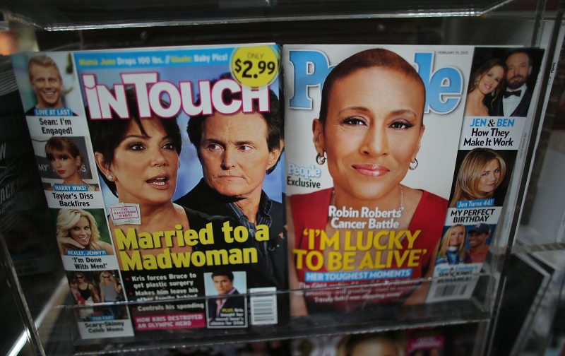 Issues of In Touch and People magazines are displayed at a newsstand in Manhattan on February 13, 2013 in New York City. (Photo by Mario Tama/Getty Images)
