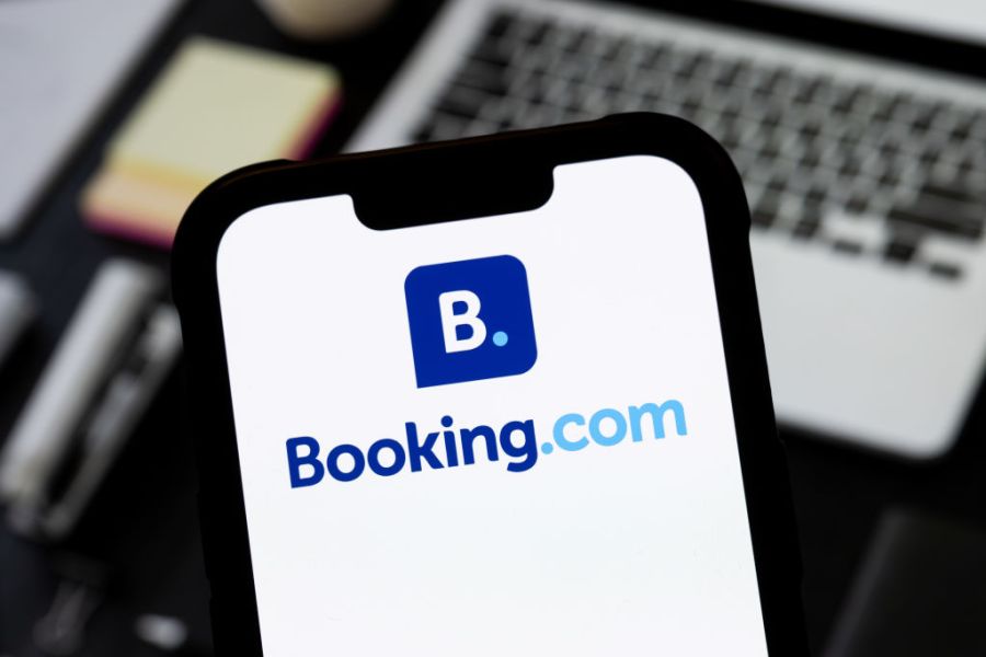 A Booking.com logo is seen displayed on a smartphone. (Photo Illustration by Mateusz Slodkowski/SOPA Images/LightRocket via Getty Images)