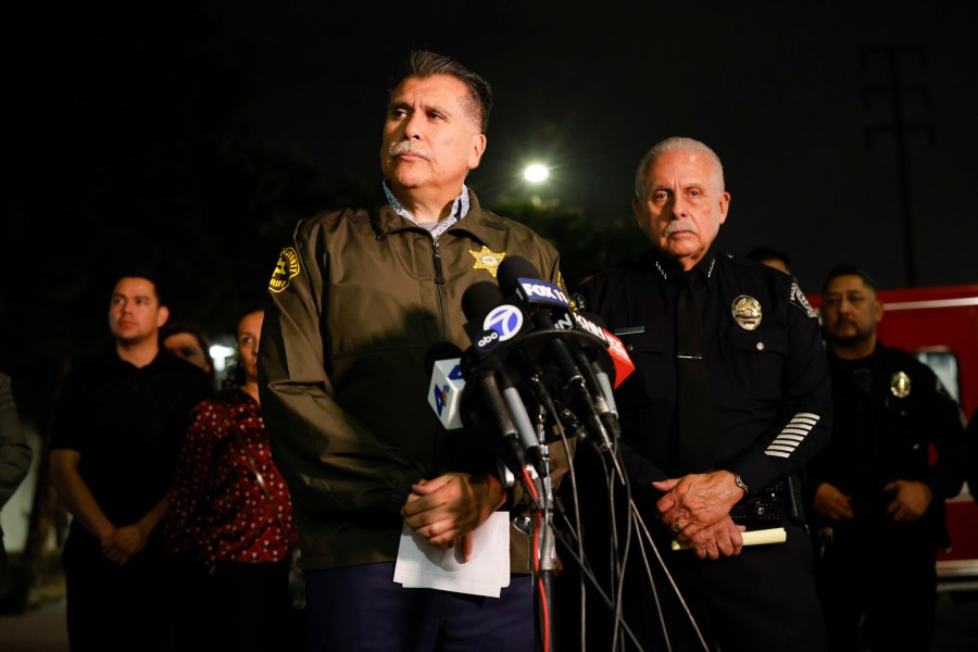 LA County Sheriff Robert Luna (left) and Baldwin Park Police Chief Robert Lopez (right) speak to press outside Los Angeles General Medical Center after a shooting in Baldwin Park leaving one police officer killed and another wounded on Sunday, June 1, 2025 in Los Angeles, CA. (Carlin Stiehl / Los Angeles Times via Getty Images)