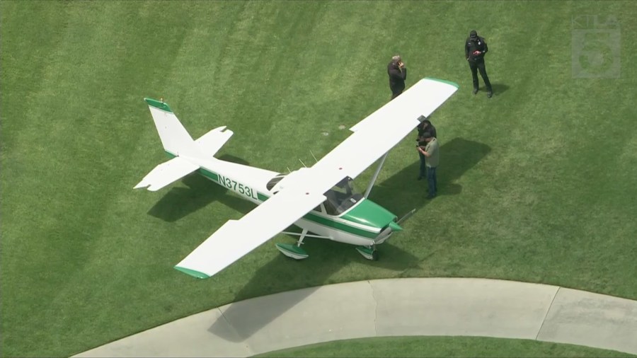 A single-engine plane is parked at the Riviera Country Club in Pacific Palisades after being forced to make an emergency landing on May 2, 2025. (KTLA)