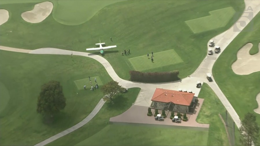 A single-engine plane is parked at the Riviera Country Club in Pacific Palisades after being forced to make an emergency landing on May 2, 2025. (KTLA)