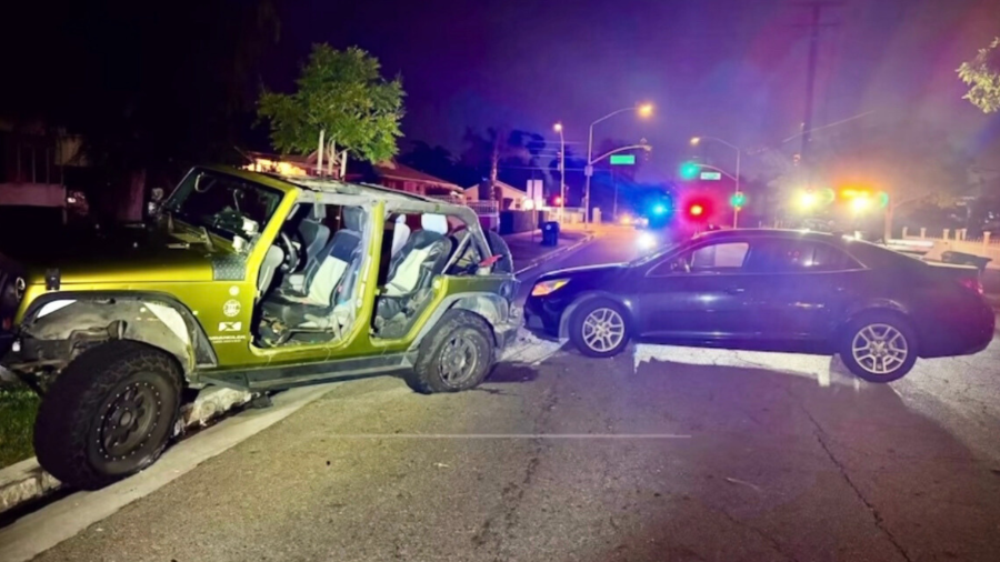 A mother was arrested on suspicion of DUI after crashing her Chevy sedan into a parked Jeep in Upland while her children were still inside on May 26, 2025. (Upland Police Department)