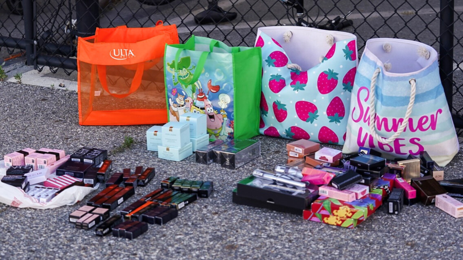 Over $12,000 worth of stolen cosmetics and high-end beauty products were found at the female suspect's home during a police search. (Rialto Police Department)