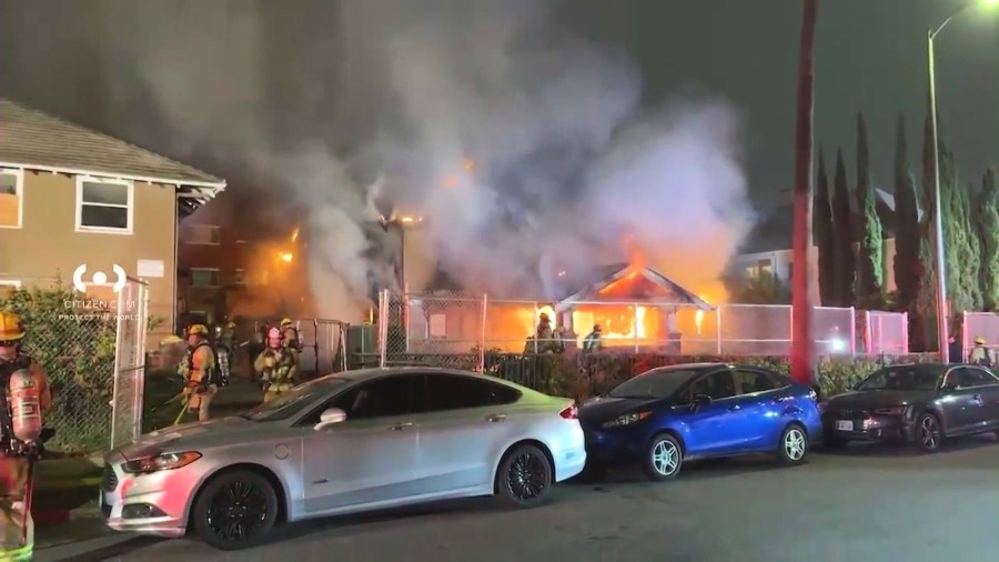 L.A. Fire Department crews demolished a vacant home that neighbors said was taken over by squatters in Hollywood after a massive fire destroyed the property on May 1, 2025. (Citizen)
