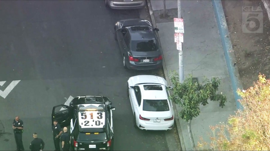 A man in a dark-colored BMW sedan that matched the shooting suspect's description was taken into custody in the Pico-Union neighborhood on May 2, 2025. (KTLA)