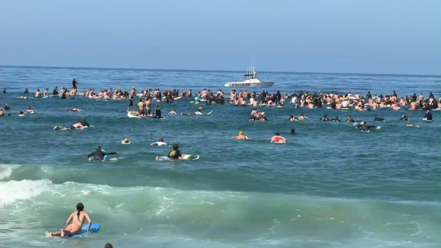 A paddle-out event was held in Braun Levi's honor in Manhattan Beach where many friends, family, classmates and community members showed up to catch a wave in the teen's honor on May 10, 2025. (KTLA)